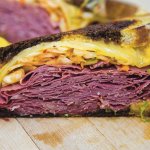 Corned beef piled high on bread