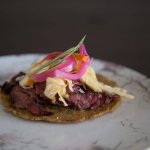 Pastrami tacos with slaw and pickled red onion